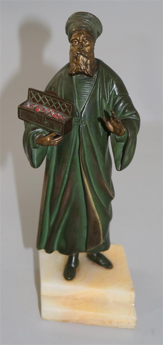 An early 20th century cold painted bronze figure of a Turkish merchant, 9in,
